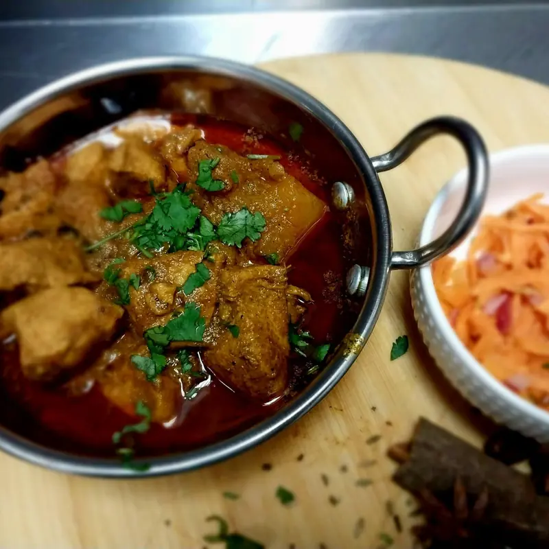 Chicken curry with potato and carrot salad